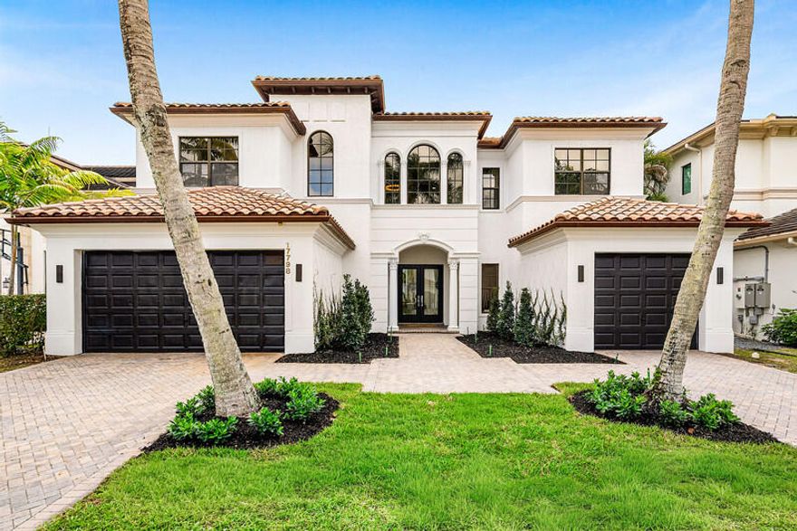 Situated in the prestigious The Oaks at Boca Raton this beautifully reimagined residence blends sophisticated design with effortless living. Interiors feature soaring ceilings, expansive living spaces, and abundant natural light. Redesigned by renowned local designer Michael Gray, the home offers elevated style and refined finishes throughout. The chef's kitchen features premium appliances and custom cabinetry flowing into the main living areas. The first floor primary suite includes dual custom closets, along with a private office and guest suite. Upstairs offers a spacious loft and generously sized bedrooms. The newly redesigned backyard features lush landscaping and porcelain pavers. Residents enjoy country club style living with exceptional amenities and no initiation fee.