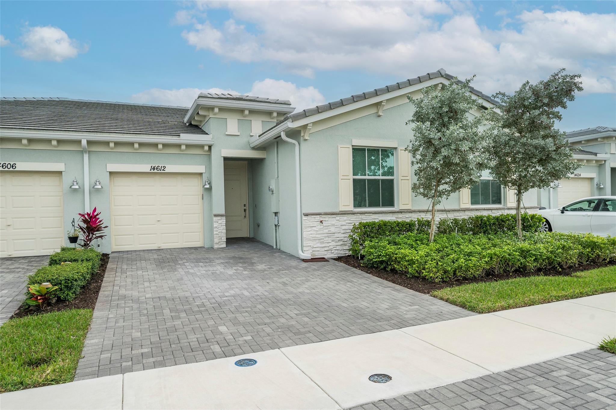 Welcome to 14612 Three Ponds Trail built in 2022 offering a stunning waterfront Villa located in the highly desirable Avalon Trails, Delray Beaches Newest 55+ Active community! As you enter the home you will immediately fall in LOVE! Enjoy open concept living with a lovely living room, spacious dining room & stunning kitchen. The kitchen is absolutely stunning with upgraded countertops, beautiful backsplash, stainless steel appliances & modern white cabinets with plenty of storage space. Both bedrooms are generously sized. The amenities within the neighborhood include a clubhouse, fitness center, cafe, entertainment theatre, outdoor pools, several athletic courts, and a walking trail. So much to offer & will not last!!