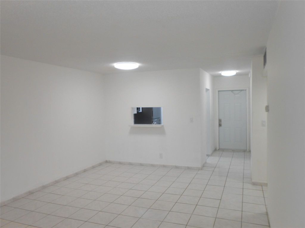 Photo of 5001 W Oakland Park Boulevard #203, Lauderdale Lakes, FL 33313 (MLS # F10486320)