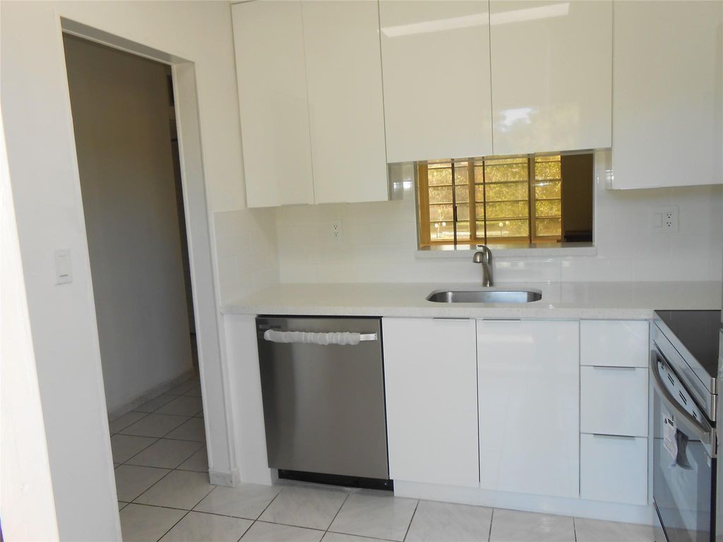 Photo of 5001 W Oakland Park Boulevard #203, Lauderdale Lakes, FL 33313 (MLS # F10486320)