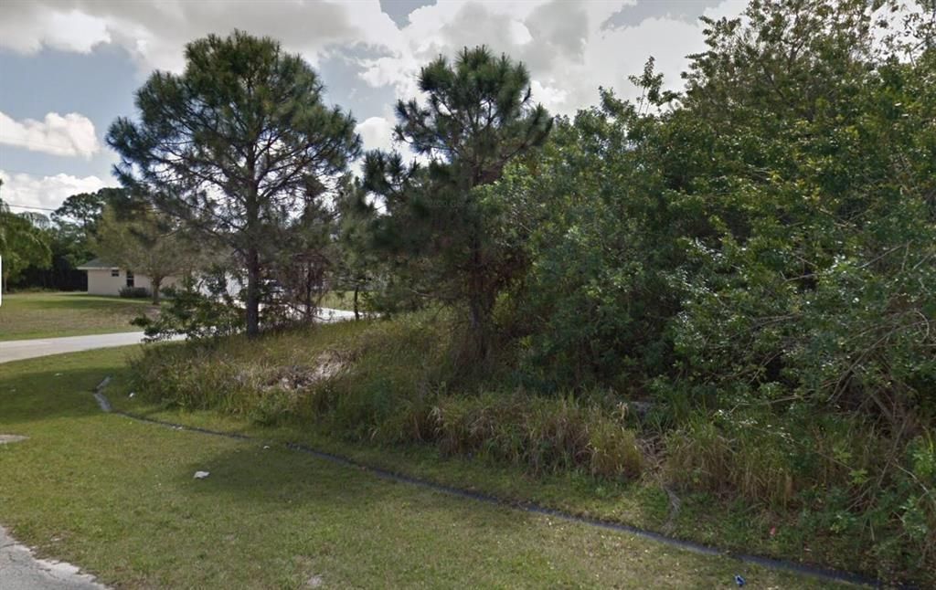 Photo of 802 SW Harvard Road, Port St Lucie, FL 34953 (MLS # R10885797)