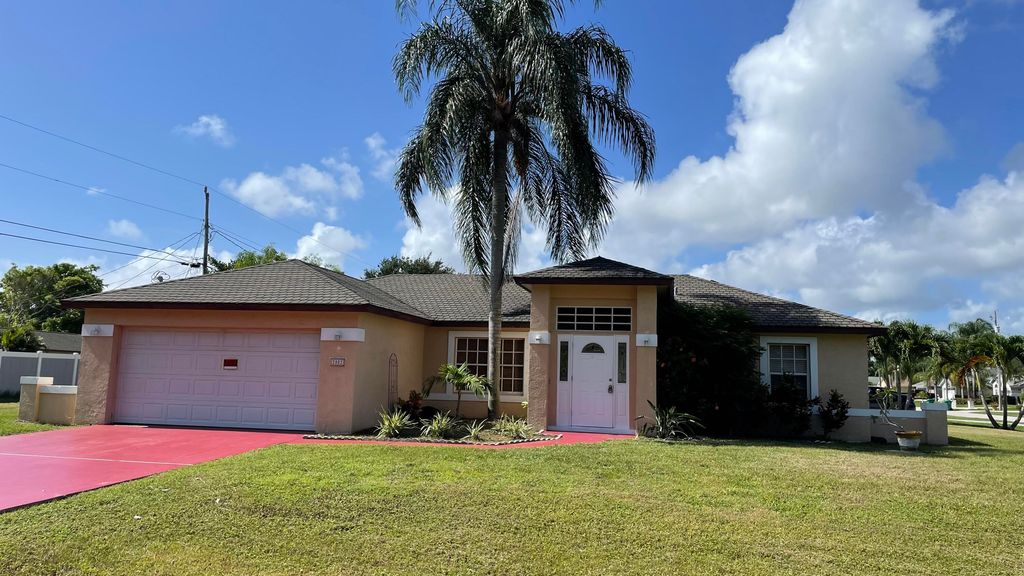Photo of 2802 SE Awin Lane, Port Saint Lucie, FL 34952 (MLS # R11001042)