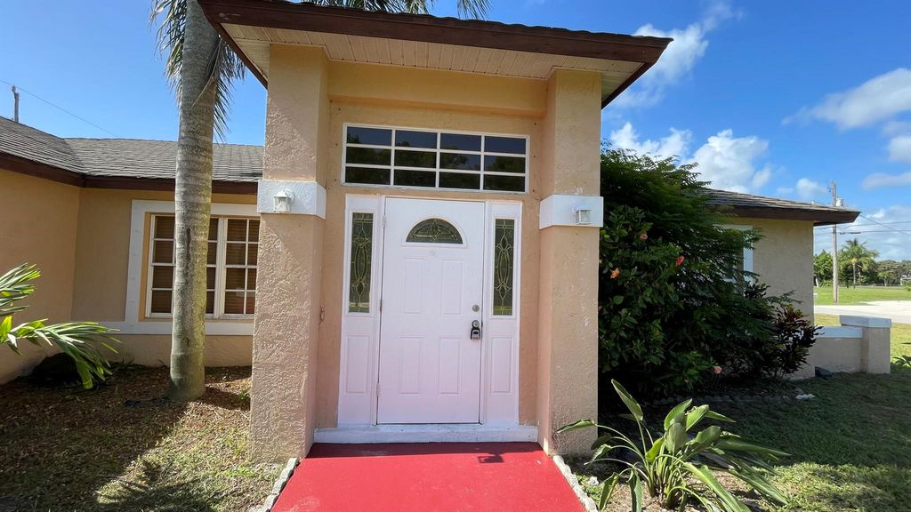 Photo of 2802 SE Awin Lane, Port Saint Lucie, FL 34952 (MLS # R11001042)