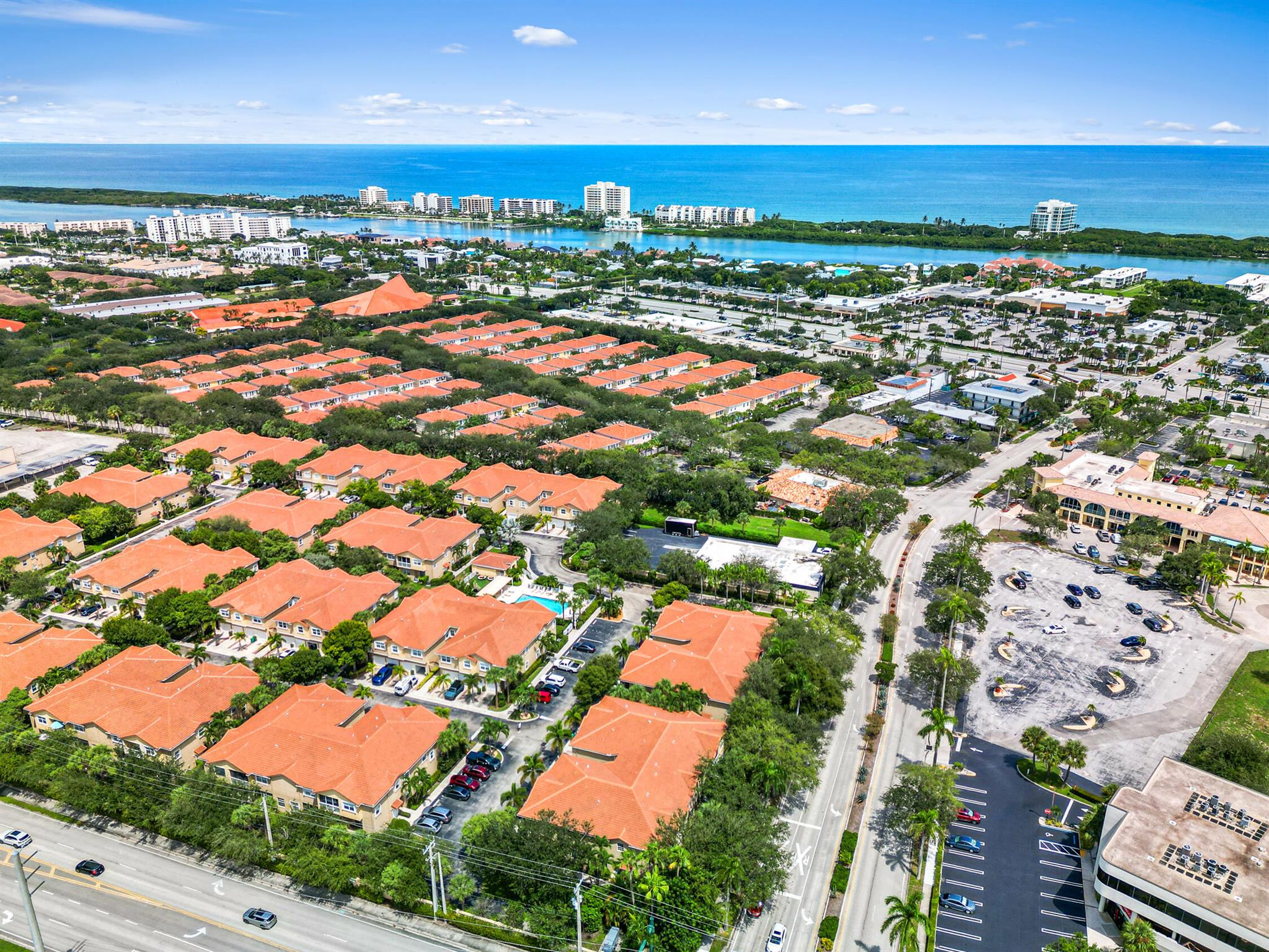 Discover coastal living at its finest in this beautifully renovated 2-bedroom, 2-bathroom condo at 112 Lighthouse Circle Unit J, nestled in the heart of the charming Tequesta Trace community in Tequesta, FL. Spanning 1032 sq ft, this bright and airy corner unit boasts an open-concept layout, perfect for both relaxing and entertaining, with an abundance of natural light streaming through large windows.This recently renovated gem features luxury vinyl plank flooring throughout, fresh paint, new countertops, and select new appliances, giving the space a modern and polished feel. The open floor plan seamlessly connects the living, dining, and kitchen areas, with volume ceilings enhancing the spacious ambiance.