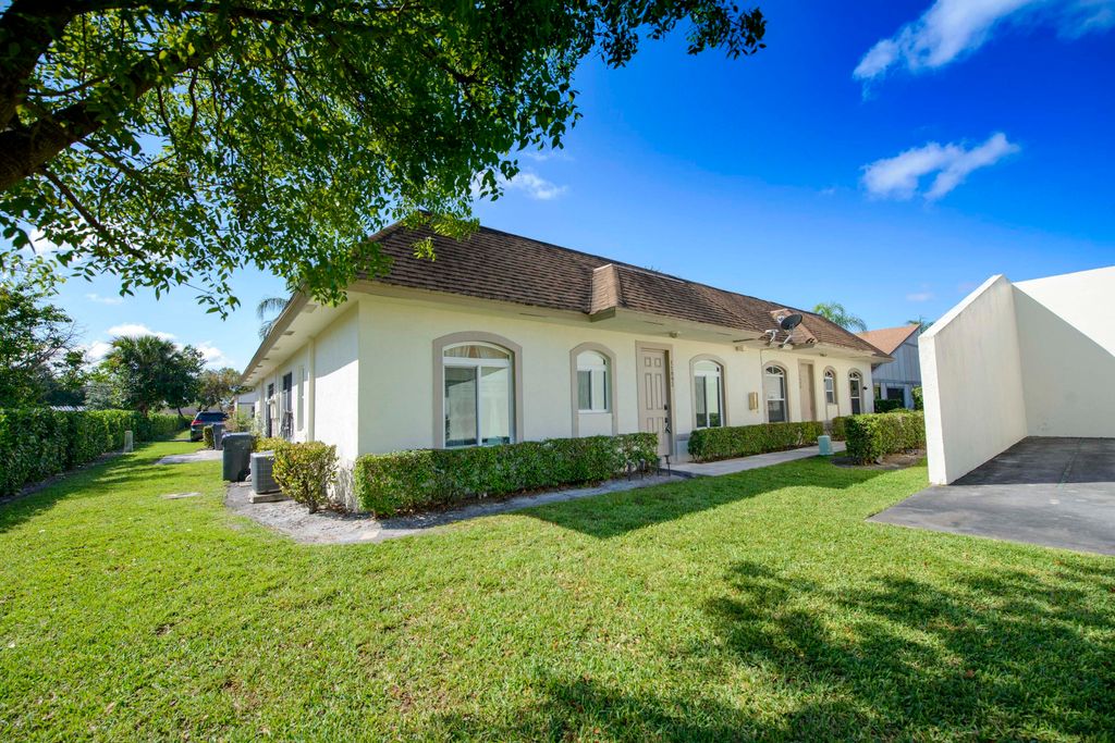 Photo of 11893 Sturbridge Lane, Wellington, FL 33414 (MLS # B26022520)