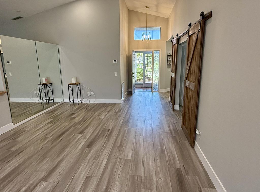 Photo of 6343 Grand Cypress Circle, Lake Worth, FL 33463 (MLS # B26007152)