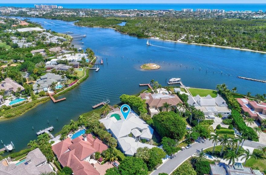 Seldom will an opportunity come along to own one of the premier lots in admirals Cove. An unobstructed view of the intercoastal, 130 feet of water frontage, and a moderate contemporary design. 6500 ft. of air-conditioned space. Six bedrooms 7 1/2 bathrooms and an extra large pool. Home is ready for remodeling. This is a ''sleeper''. Make it your dream home!!