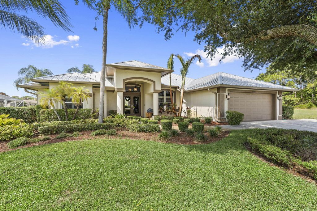 Photo of 6001 NW Telford Avenue, Port Saint Lucie, FL 34983 (MLS # B26025423)