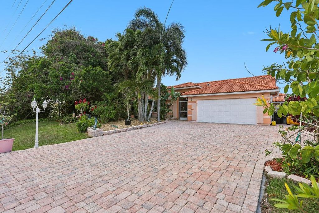 Photo of 133 NE Sagamore Terrace, Port Saint Lucie, FL 34953 (MLS # R10972068)