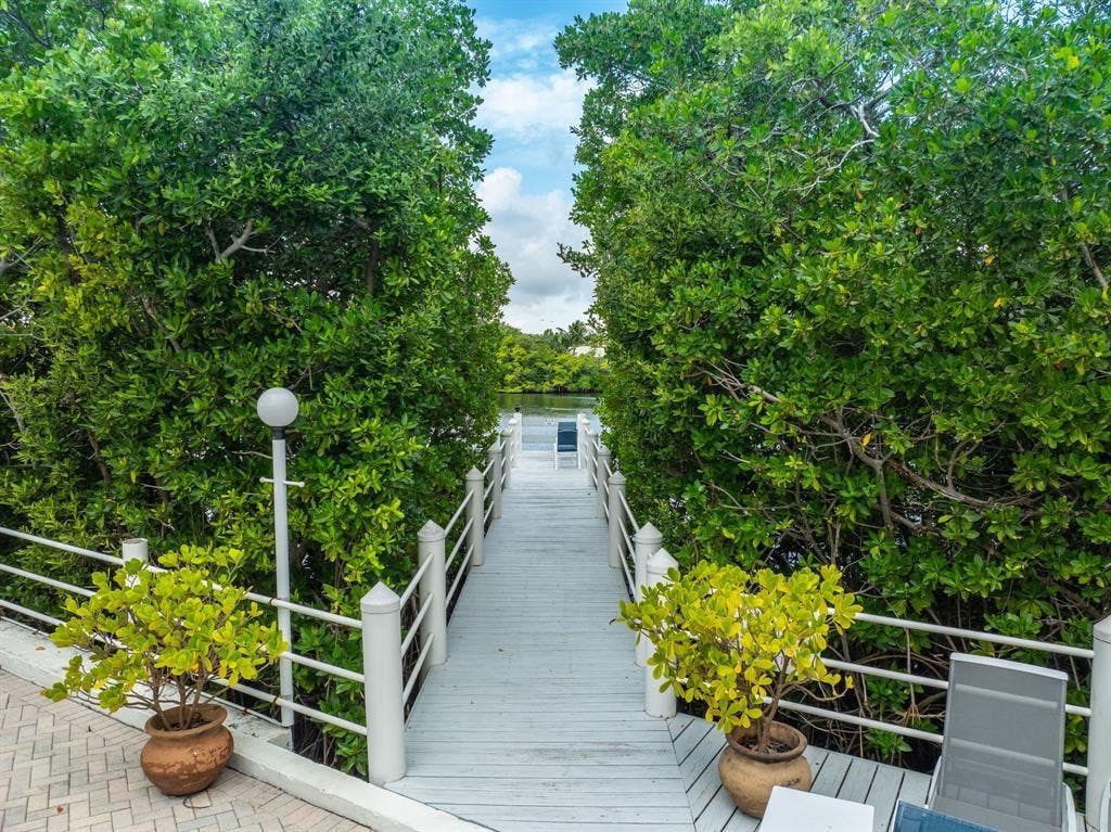 Photo of 3601 S Ocean Boulevard #406, South Palm Beach, FL 33480 (MLS # F10549773)