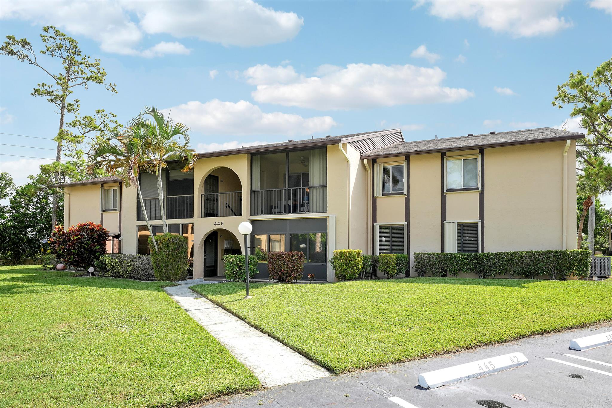Welcome to this beautifully maintained 2BD, 2BA ground-floor condo in the 55+ community of Pine Ridge South IV. Freshly painted with brand new laminate flooring throughout--no carpet here! Step into a spacious screened patio with extra storage, then into an inviting open floor plan with a large living room and a kitchen featuring newer appliances. Enjoy a full laundry room with a brand new washer and dryer. The primary suite offers a walk-in closet and private bath, while the second bedroom also features a walk-in closet and easy access to the guest bath. Community amenities include a pool, clubhouse, fitness center, shuffleboard, and more. Cable and internet included in the affordable HOA dues!