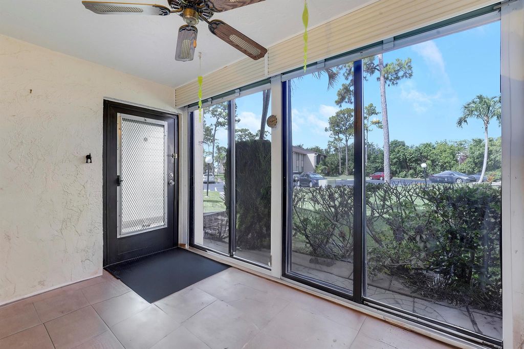 Photo of 445 Pine Glen Lane #A-1, Greenacres, FL 33463 (MLS # R11105438)