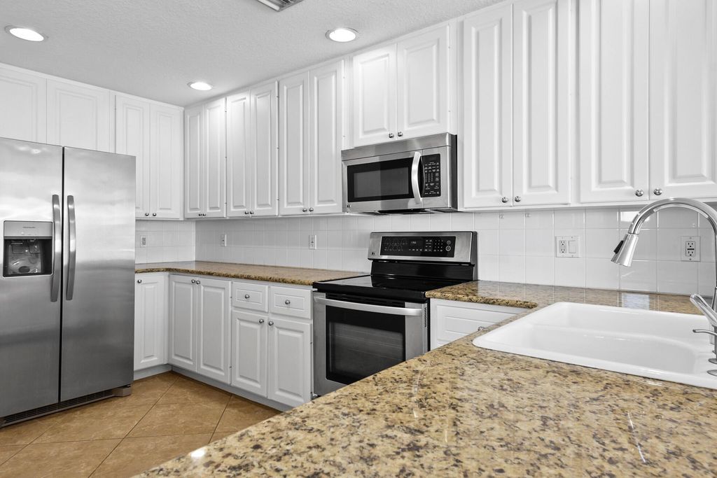 Photo of 1836 Jeaga Dr, Jupiter, FL 33458 (MLS # R11017736)