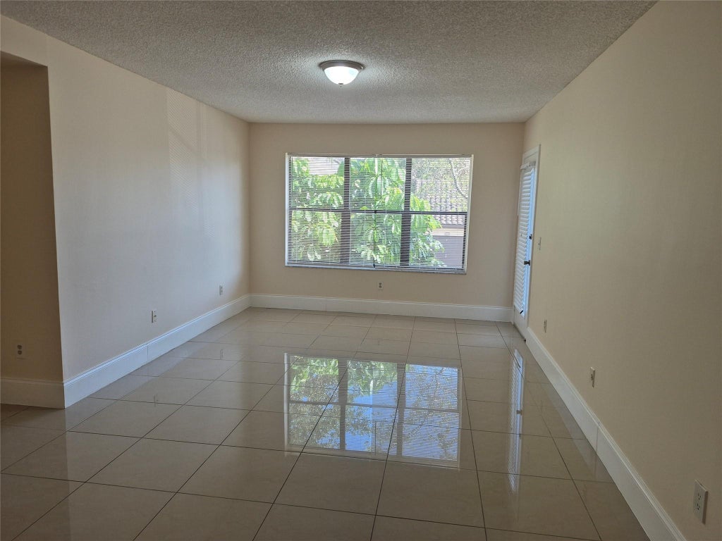 Photo of 4281 W MCNAB Road #24, Pompano Beach, FL 33069 (MLS # B26078429)