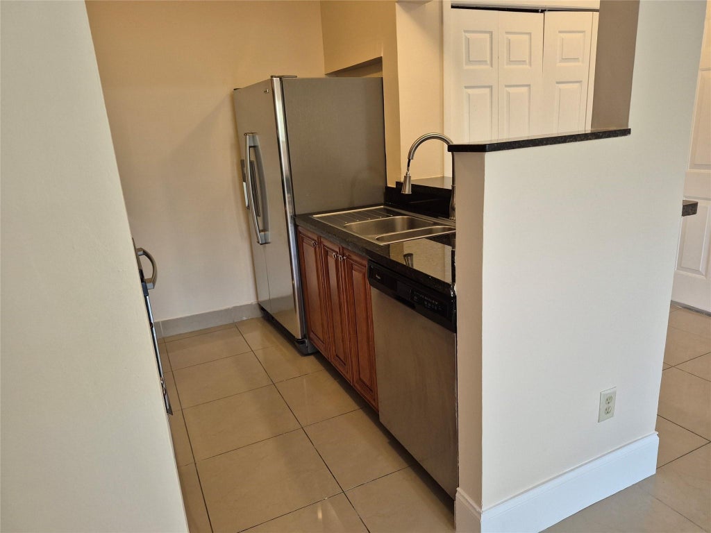 Photo of 4281 W MCNAB Road #24, Pompano Beach, FL 33069 (MLS # B26078429)