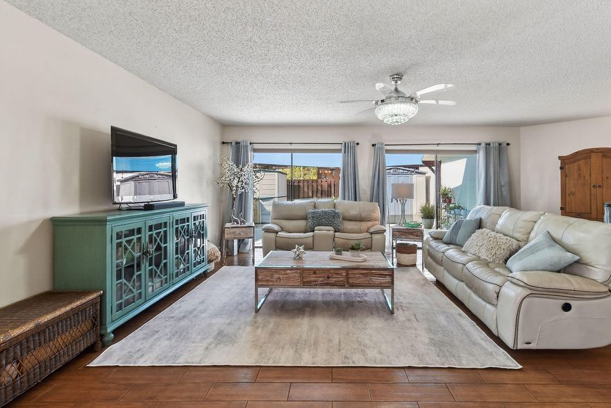 Welcome to this inviting townhouse in Royal Palm Beach, offering comfortable, low-maintenance living in a convenient location with easy access to West Palm Beach, major roadways, shopping, dining, and everyday essentials. The light-filled main level features an open living and dining area with tile flooring, ideal for relaxing or entertaining. The kitchen offers ample cabinet space, generous counters, and a pantry for added storage. Upstairs, the spacious primary suite includes a walk-in closet and private bath, plus two additional bedrooms perfect for a home office, guests, or flexible living. Recent updates include a new roof in 2022 and a replaced fence in 2023. Enjoy a private patio, fenced outdoor space, and community pool, basketball courts, sidewalks, and bike paths. Pets welcome, with easy access to West Palm Beach.