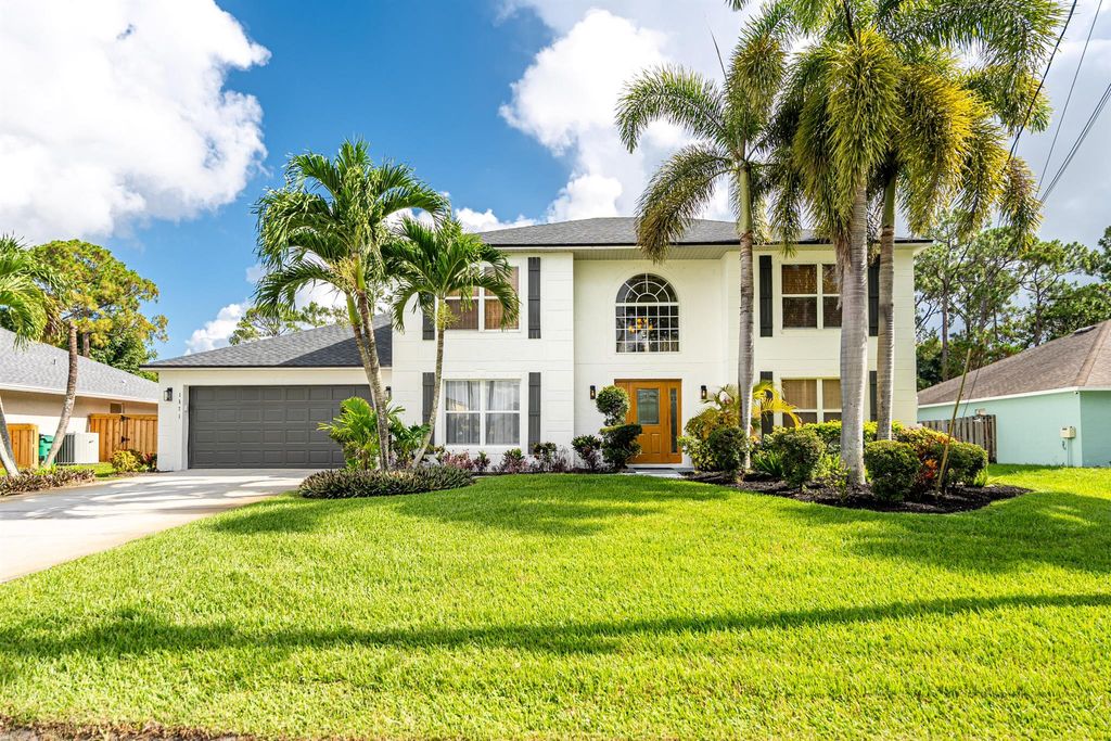 Photo of 1571 SW Delos Avenue, Port Saint Lucie, FL 34953 (MLS # R11099267)