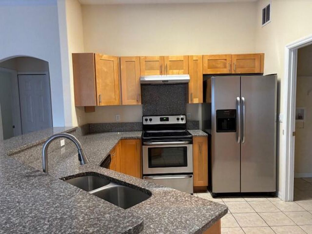 Photo of 2402 SW Waikiki Street E, Port Saint Lucie, FL 34953 (MLS # R11017389)