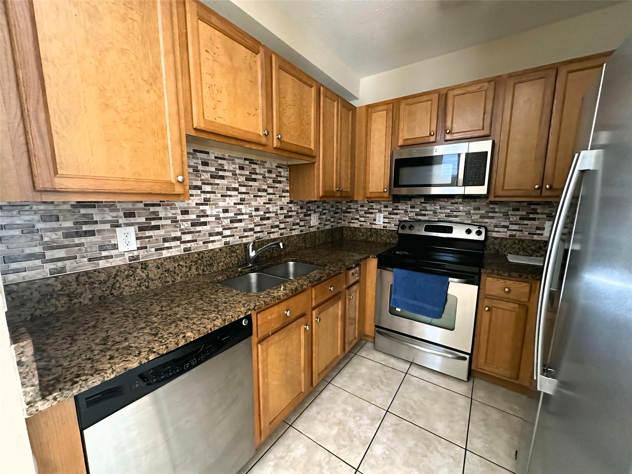 This beautiful 3-bedroom, 2.5-bathroom corner home in a gated community offers security, exclusivity, and amenities like a playground, pool, and two assigned parking spots. The open-concept first floor features a living/dining area, a TV room or office space, a small cellar under the stairs, and a half bathroom. The kitchen boasts granite countertops, wood cabinets, and stainless steel appliances illuminated by natural light. Upstairs are three spacious bedrooms and two full baths. Located near Miramar's downtown, top-rated schools, shopping, dining, and major highways like I-75 and the Turnpike. Please see the MLS attachment for the association application form and list of rental requirements.