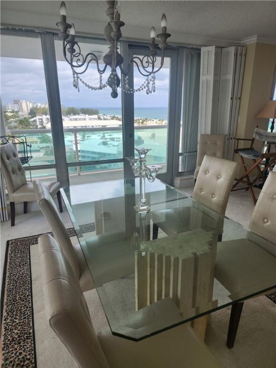 PRICED TO SELL!!!!  LARGEST 1 BEDROOM  1 1/2 BATHROOM IN THE BUILDING JUST UNDER 1300 SQ FT.  INCREDIBLE VIEWS OF THE OCEAN FROM THE OVERSIZED TERRACE!! LIVE IN LUXURY WITH THE 5 STAR RESORT AMMENITIES THIS BUILDING HAS TO OFFER.  EXTRA LARGE ROOMS WITH EAT IN KITCHEN AND SEPERATE DINING ROOM.  WASHER/DRYER IN KITCHEN, HURRICANE SHUTTERS.  OWN A PIECE OF PARADISE WITH THE LARGEST AREA OF DEEDED BEACH IN THE FORT LAUDERDALE AREA.  THIS UNIT WON'T LAST