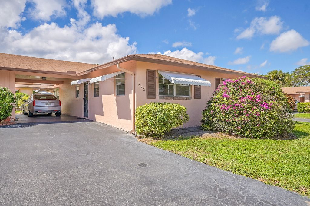 Photo of 302 Flamingo Lane, Delray Beach, FL 33445 (MLS # R11066473)