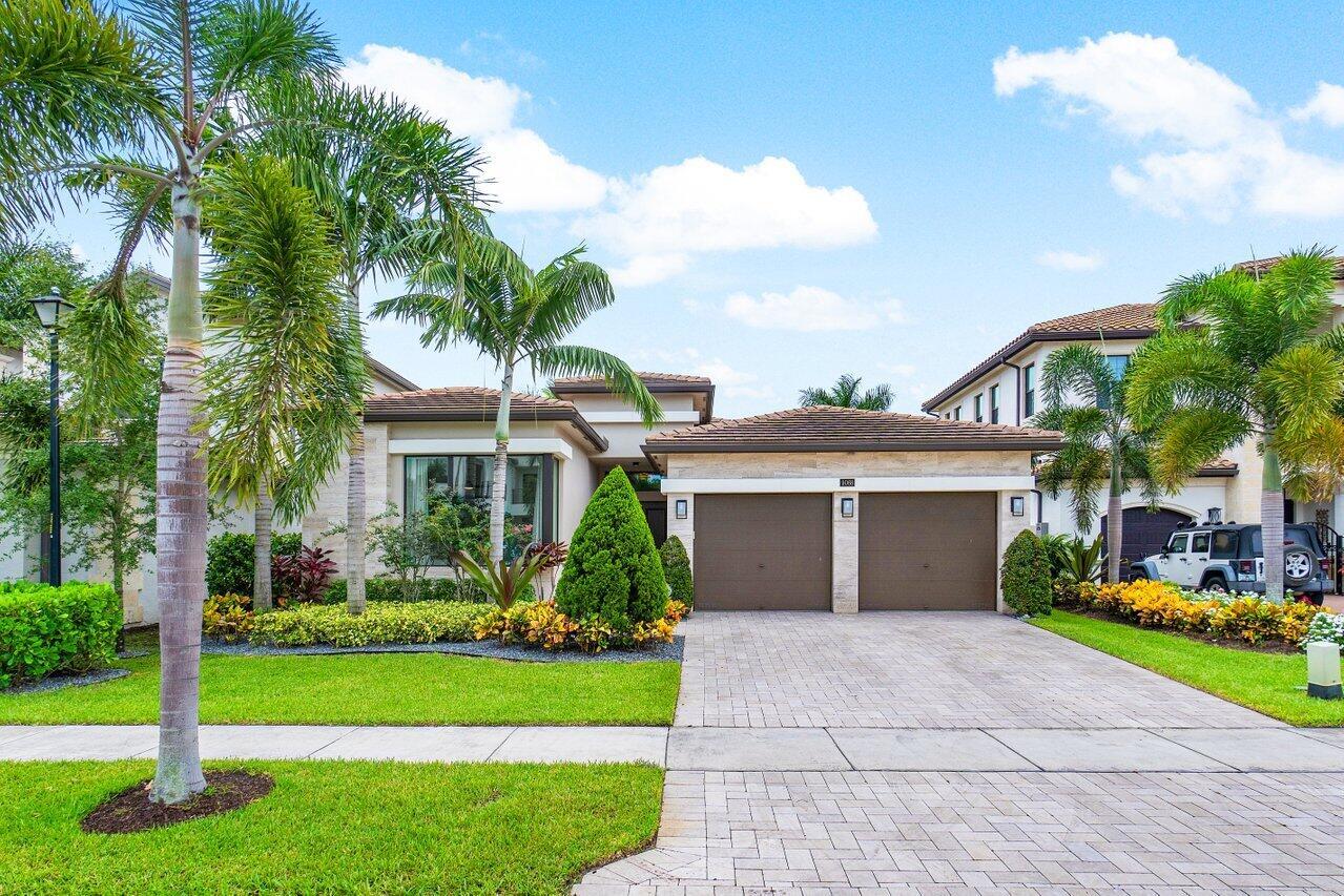 Modern elegance begins before you even enter the home! The contemporary exterior elevation sets the tone for this one-story Seville model in coveted Boca Bridges. Original owner spends half the year in Italy, this property feels brand new. Every inch of this home is upgraded including: gourmet kitchen with upgraded wood cabinetry, oversized waterfall quartz island, Generac generator, AC in garage, custom outdoor kitchen with vented hood, fridge and sink, motorized retractable outdoor screen, custom built-ins, moldings and electronic curtains/shades, full water filtration. This 3 bed (4th optional bedroom currently office) 3.5 bath home is lakefront with views of Italian cypress trees, no rear neighbors! Oversized lot, space for pool and extra land. Boca bridges offers top tier amenities!