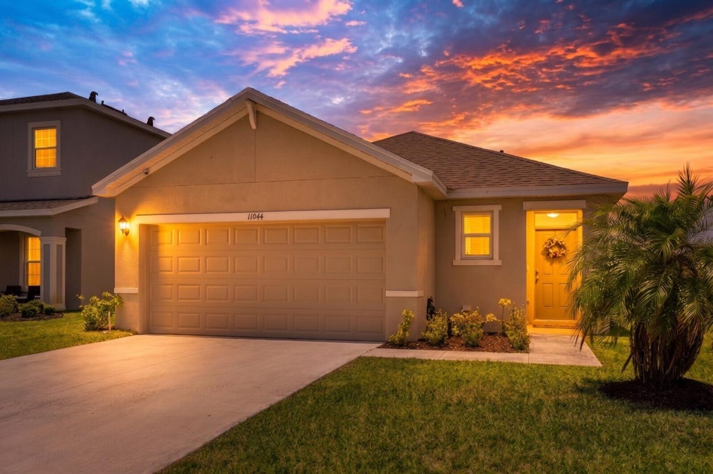 Photo of 11044 SW Vasari Way, Port Saint Lucie, FL 34987 (MLS # B26039185)