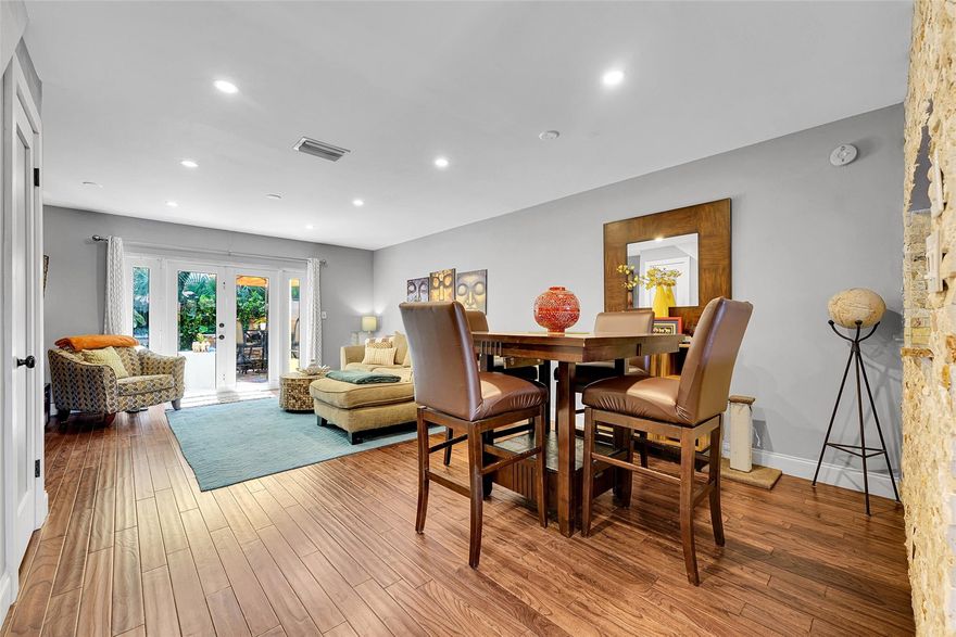 Location, Location, Location! This tastefully updated townhouse has French doors that open to a beautiful back courtyard which opens up to a tree covered common area behind the community clubhouse. Great space for entertaining! Inside this move in ready home, updates include kitchen, baths, flooring, newer washer / dryer, A/C, impact windows & doors ... all under a newer roof! Lots of closet space, too! Low maintenance includes reserves, cable, clubhouse, gym, pool (being updated now) and trash removal. Pines West is the only gated community in Oakland Forest! Seller is willing to assist the buyer with closing costs! Make an offer!