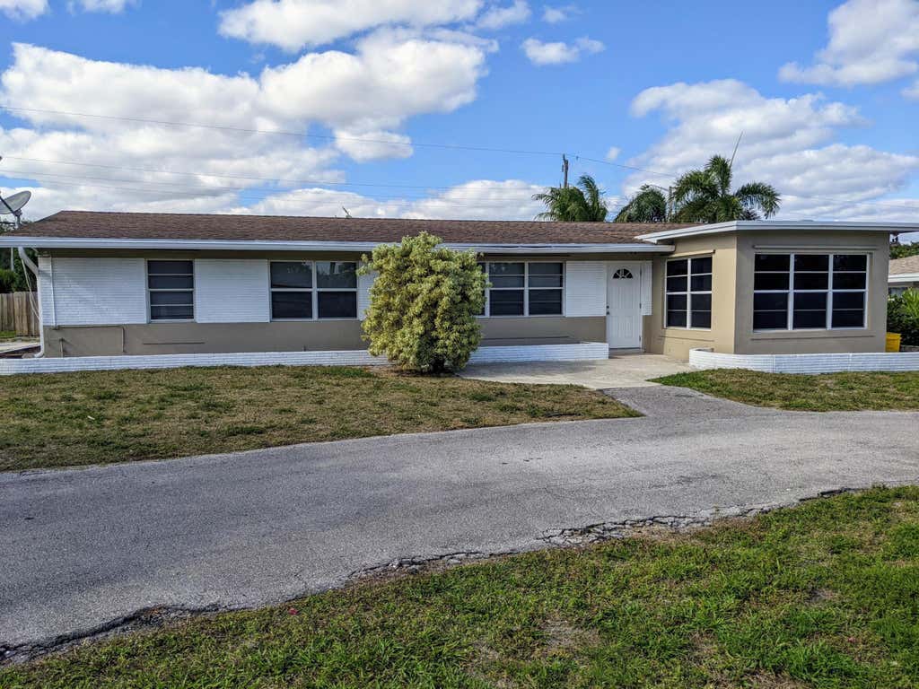Photo of 299 NW 12th Street, Boca Raton, FL 33432 (MLS # B26038855)