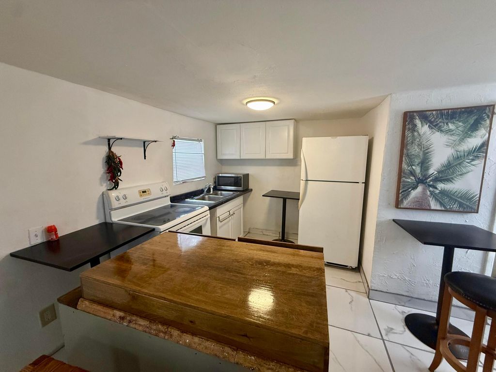 Photo of 4870 Canal RD #4870, West Palm Beach, FL 33415 (MLS # B26031036)