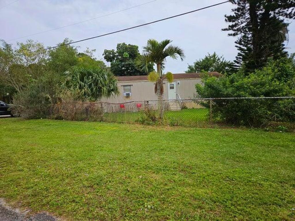 Photo of 4870 Canal RD #4870, West Palm Beach, FL 33415 (MLS # B26031036)