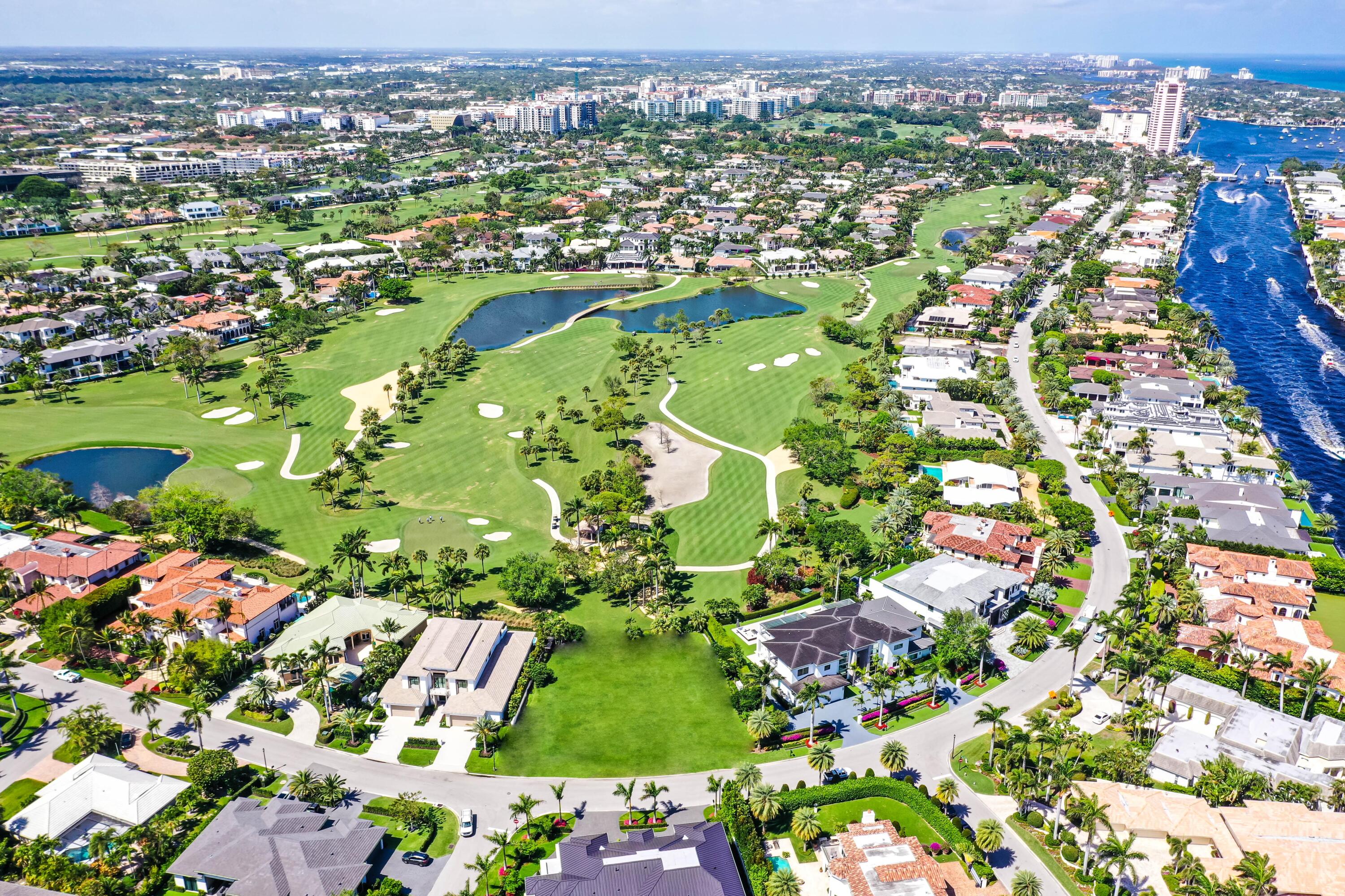 Once in a lifetime lot, almost a half acre on the golf course in Royal Palm Yacht and Country Club 180 ft of frontage Very private yet long range magnificent views. Build your dream home on the best golf course lot in Royal PalmExisting structure scheduled to be demolished.