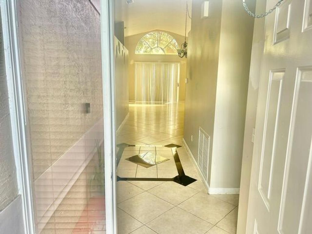 Photo of 7584 Thornlee Drive, Greenacres, FL 33467 (MLS # B26012078)