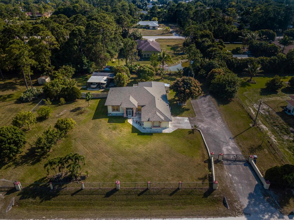 Photo of 14884 66th Street N, The Acreage, FL 33470 (MLS # R10975471)