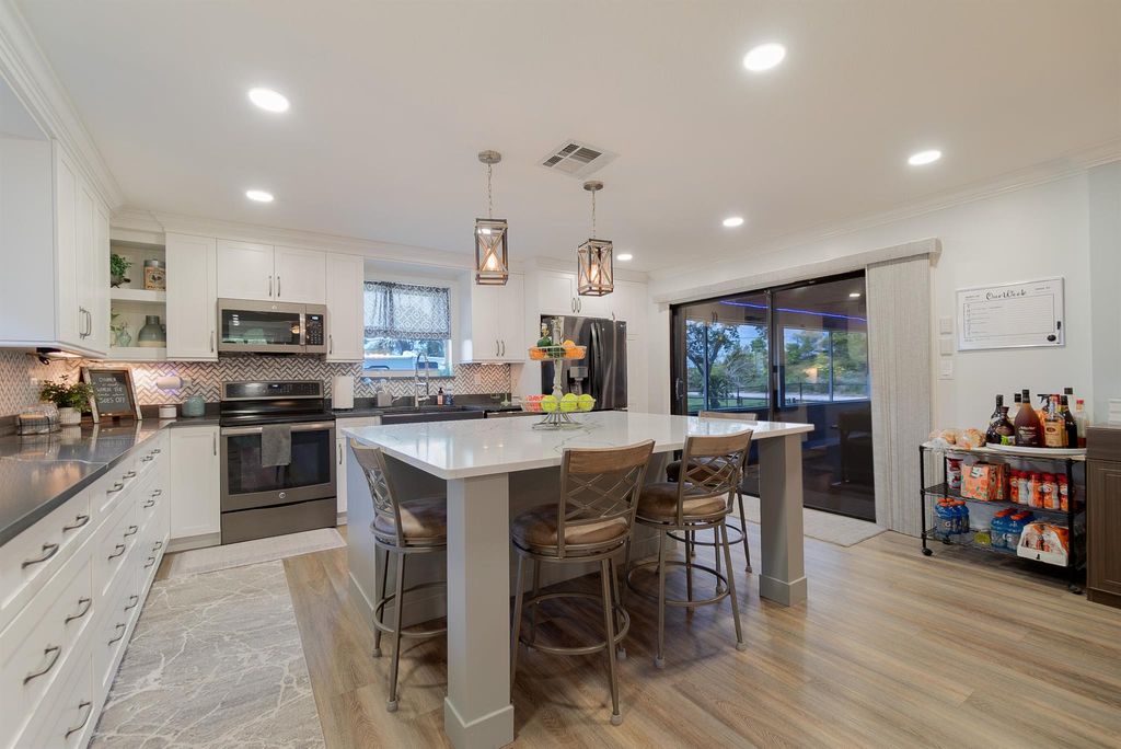 Photo of 9166 SE Karin Street, Hobe Sound, FL 33455 (MLS # R10992257)