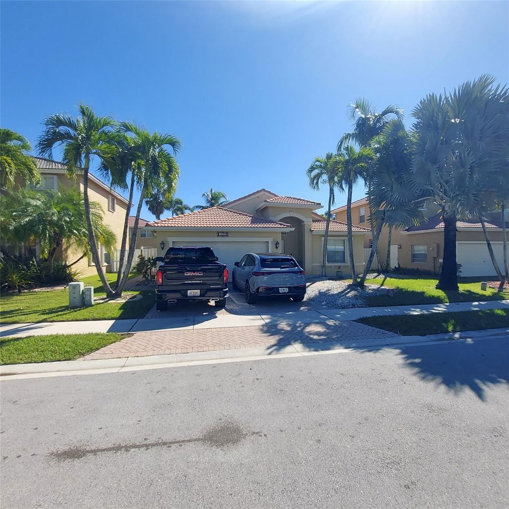 Photo of 1563 SW 187th Ter, Pembroke Pines, FL 33029 (MLS # F10531394)