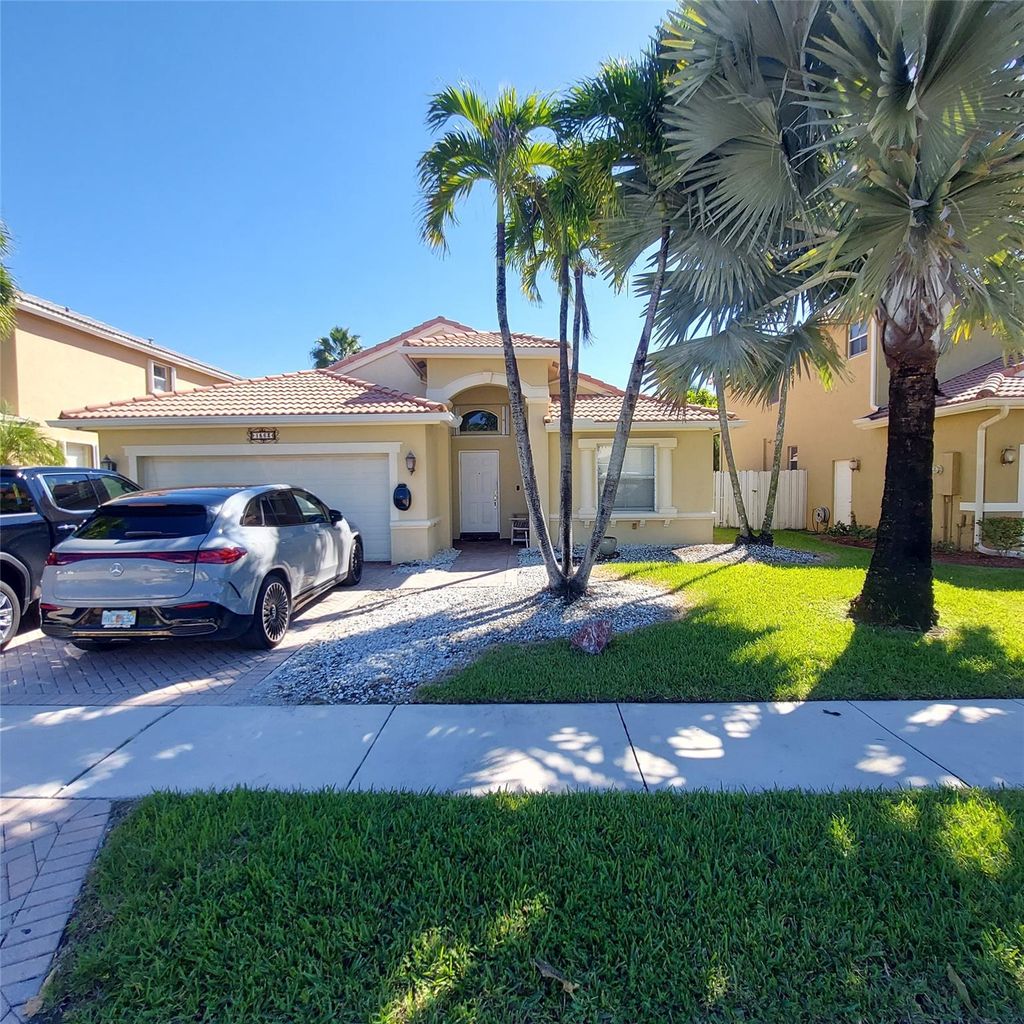 Photo of 1563 SW 187th Ter, Pembroke Pines, FL 33029 (MLS # F10531394)