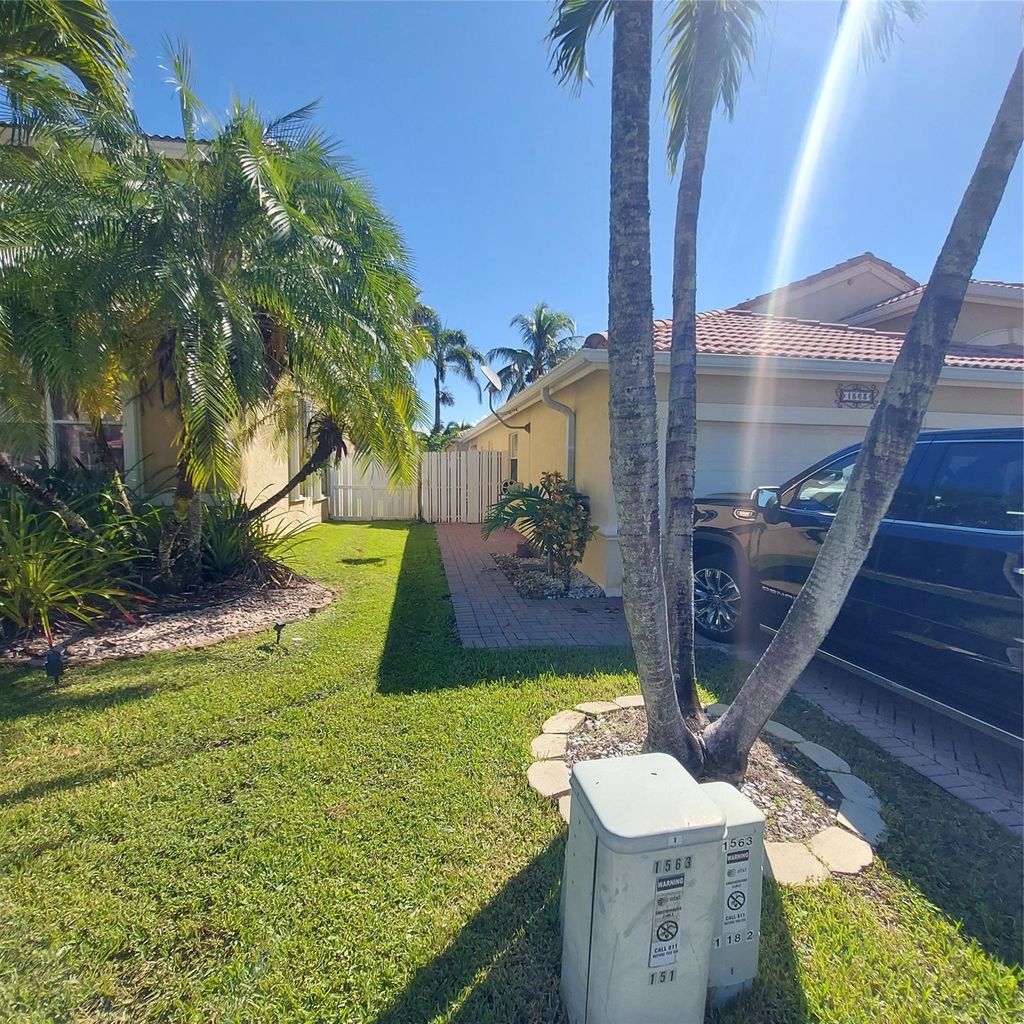 Photo of 1563 SW 187th Ter, Pembroke Pines, FL 33029 (MLS # F10531394)