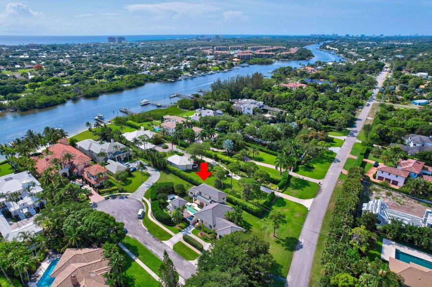 PRICE REDUCTION! Rarely available opportunity in exclusive Commodore's Pocket, a private 5-home enclave off quiet Marys Way cul-de-sac/Palmwood Rd. near the Intracoastal amongst surrounding multi-million dollar estates. This architect-designed, 1-of-a-kind estate features 2-story main residence w/ 1st-floor primary suite. Detached 2-story guest house w/ private entry, kitchenette, cabana bath and upstairs guest suite or office. Ultra-private courtyard oasis with tropical landscaping on a .43-acre lot. 60' lap pool and gas heated spa nestled in botanical tranquility creating the feel of a private resort. Newer roof (2017), 3 A/C's, impact sliders/windows (partial and shutters), plantation shutters, mahogany doors, cypress ceiling, Sub-Zero refrigerator and cold plunge shower. Hidden Gem!