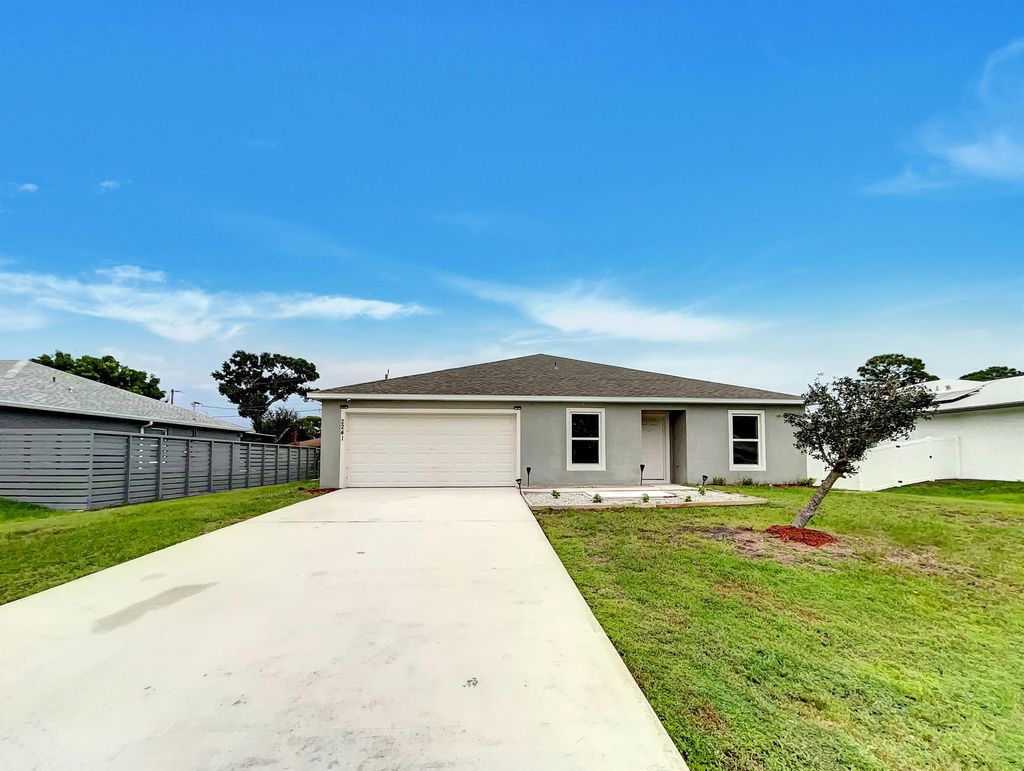Photo of 2241 SE Manor Avenue, Port Saint Lucie, FL 34952 (MLS # R11125476)