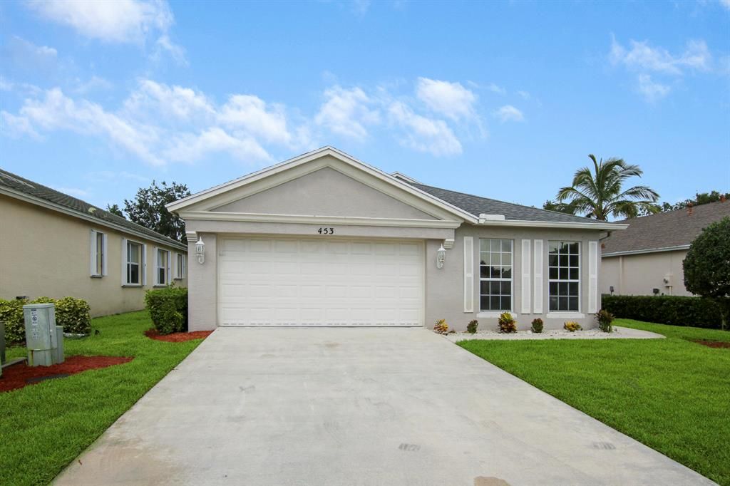 Photo of 453 SW Talquin Lane, Saint Lucie West, FL 34986 (MLS # R10725881)