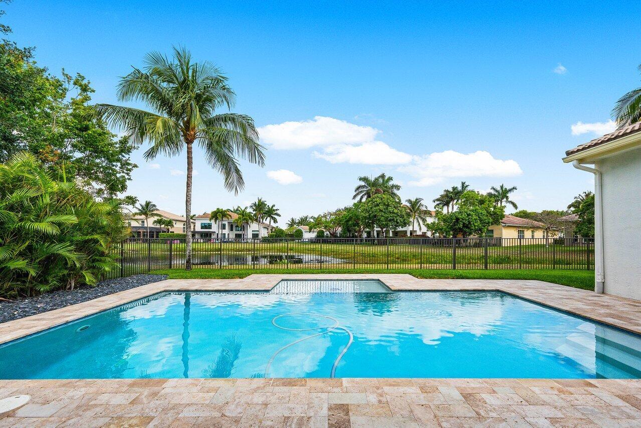 Once-in-a-Lifetime Saltwater Pool HomeOpportunities like this don't come around often. This one-story, 5-bedroom, 4-bathroom masterpiece with a triple split floor plan for maximum privacy sits on an oversized quarter-acre lot in the prestigious gated community of Canyon Springs. From the moment you arrive, you'll know this isn't just another house -- it's the home.Step inside and experience the perfect blend of style and comfort. The fully remodeled 2025 kitchen is designed for both everyday living and entertaining. Elegant finishes like crown moulding, plantation shutters, custom closets, bamboo wood flooring in the bedrooms, accordion shutters, and glass shower enclosures elevate every space. Even the hurricane-impact front door combines safety with sophistication.