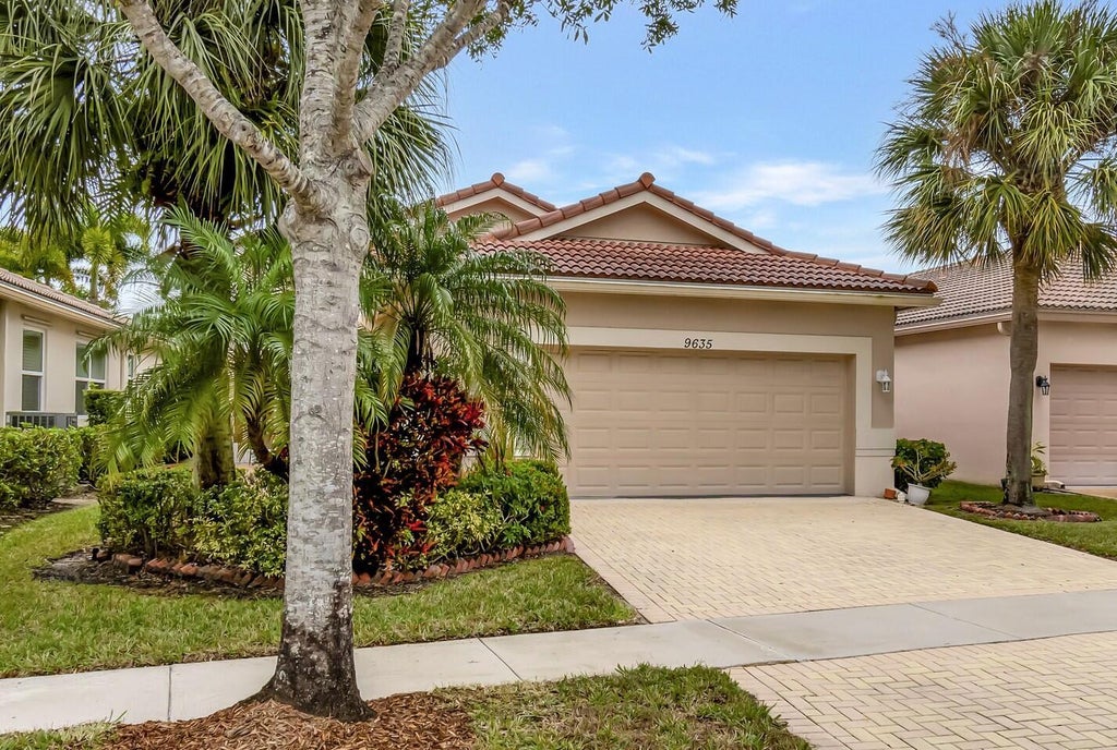 Photo of 9635 Sandpiper Shores Way, West Palm Beach, FL 33411 (MLS # B26037122)