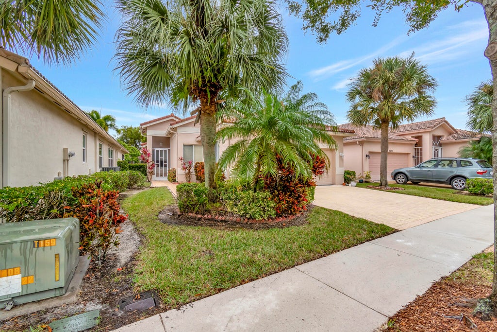 Photo of 9635 Sandpiper Shores Way, West Palm Beach, FL 33411 (MLS # B26037122)