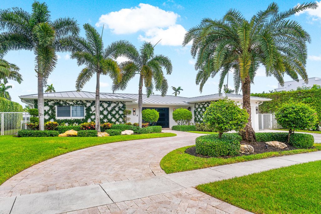 Photo of 711 NE 69th Street, Boca Raton, FL 33487 (MLS # R11167116)