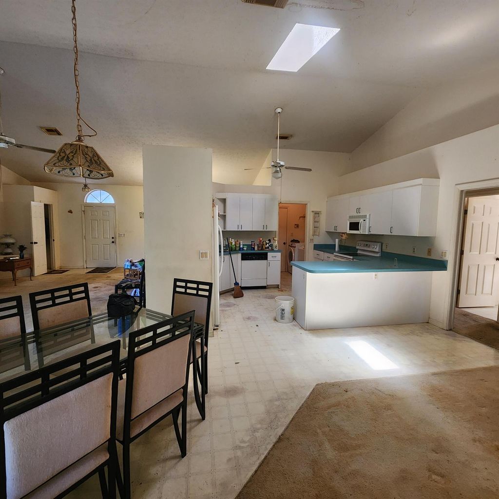 Photo of 2449 SE Rock Springs Drive, Port Saint Lucie, FL 34952 (MLS # R11005114)