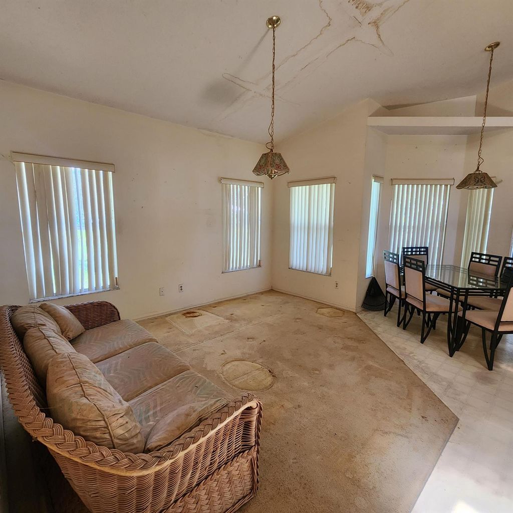 Photo of 2449 SE Rock Springs Drive, Port Saint Lucie, FL 34952 (MLS # R11005114)