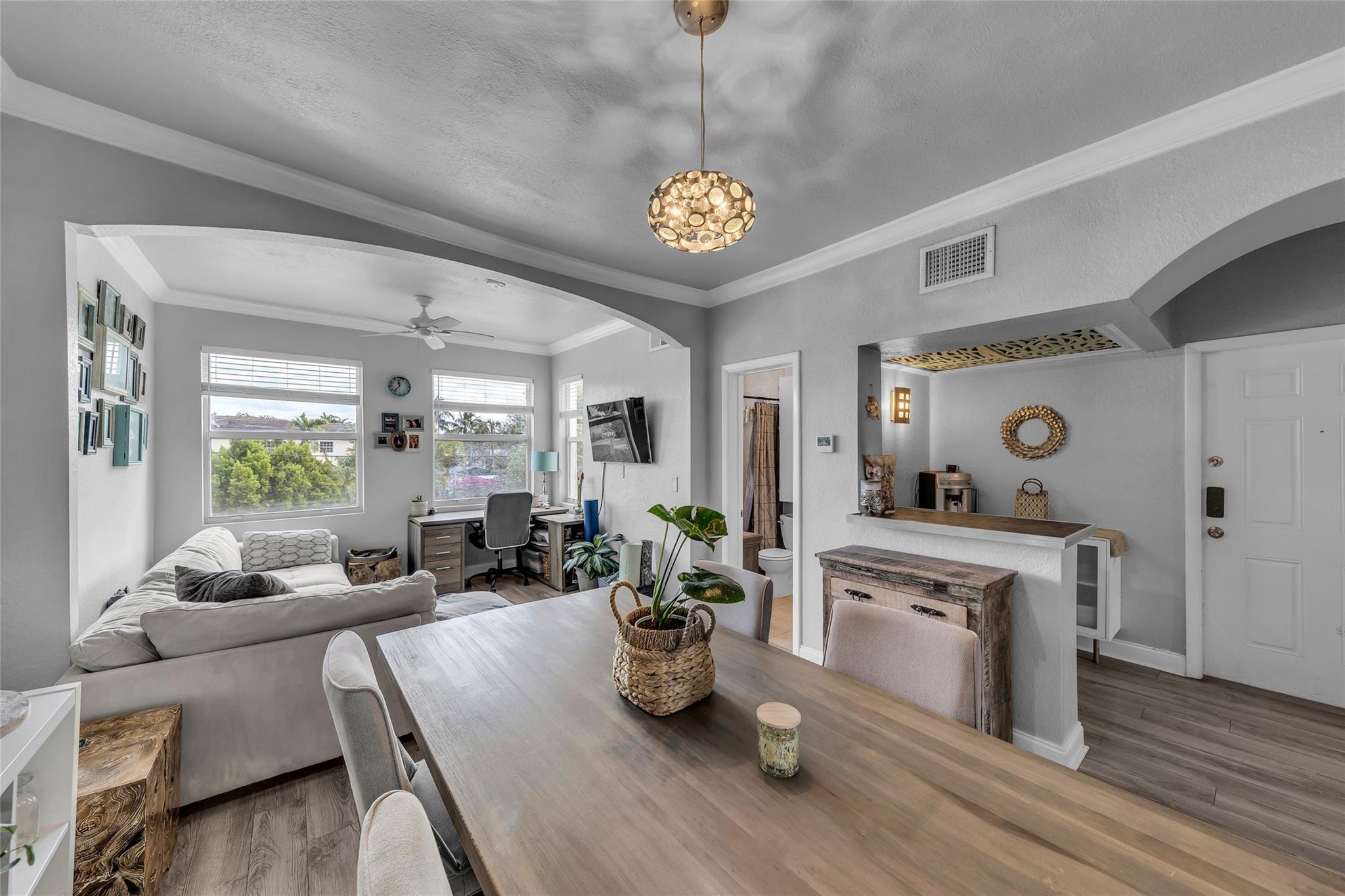 Turnkey top-floor 1 bed/1 bath condo in a boutique Victoria Park building, just moments from Las Olas! This beautifully updated unit features engineered wood floors throughout the living areas and a kitchen with newer stainless steel appliances and a newer full-size washer/dryer. The open-concept living space is filled with natural light, offering ample room for a home office, dining, and relaxation. The bedroom features pool views and a custom-built closet. Ok to lease 1st yr and pet-friendly building. This private 8-unit community features a pool, spa, BBQ area, assigned off-street parking and guest parking. Charming & vibrant tree-lined neighborhood ideally located near Las Olas, Downtown, Flagler, the beach, Brightline, FTL/Hollywood Intl Airport, & major highways.