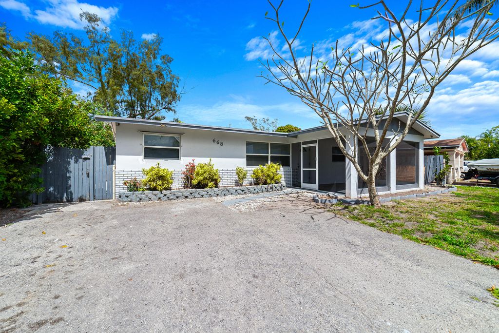 Photo of 668 Snead Circle, West Palm Beach, FL 33413 (MLS # B26002839)