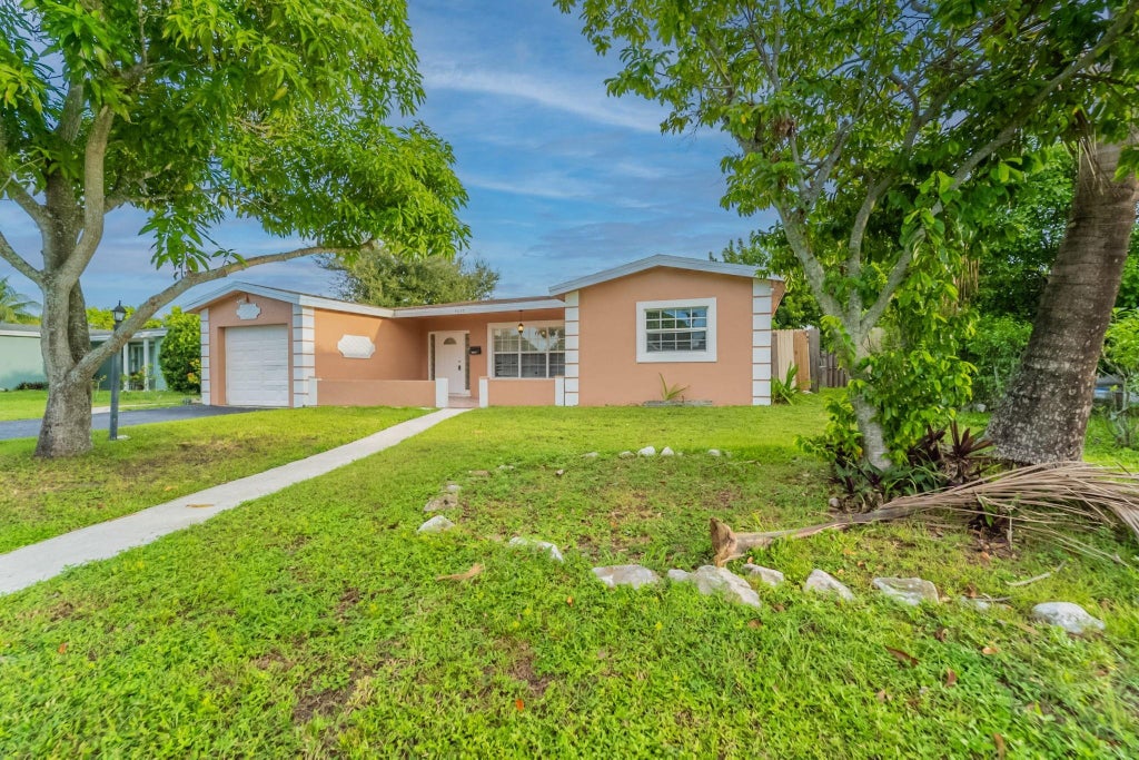 Photo of 4655 NW 41st Place, Lauderdale Lakes, FL 33319 (MLS # F10523373)